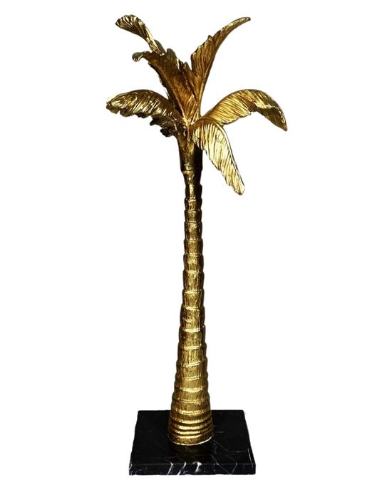 Zelta banānkoka statuja 