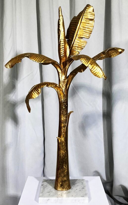 Zelta banānkoka statuja 