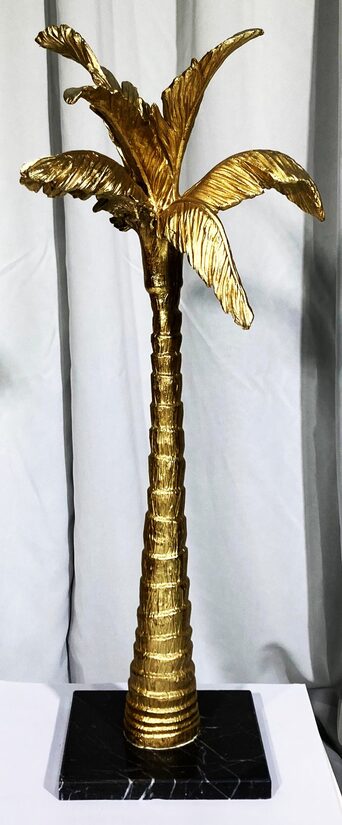 Zelta banānkoka statuja 