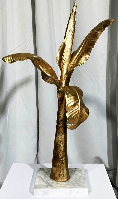 Zelta banānkoka statuja 