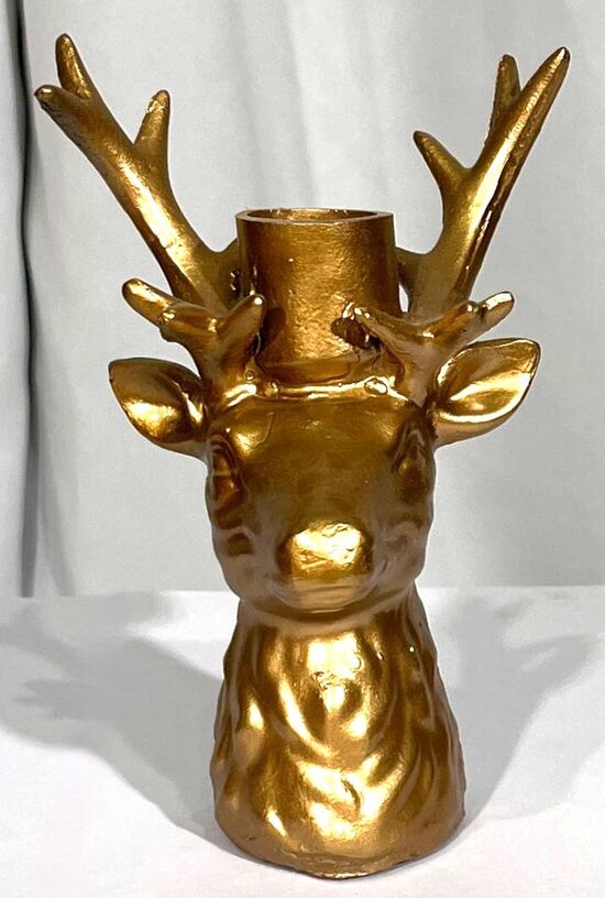 Zelta briedis svečturis