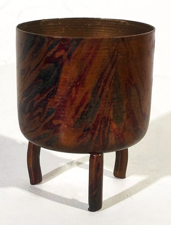 Krāsains podiņš ar kājiņām